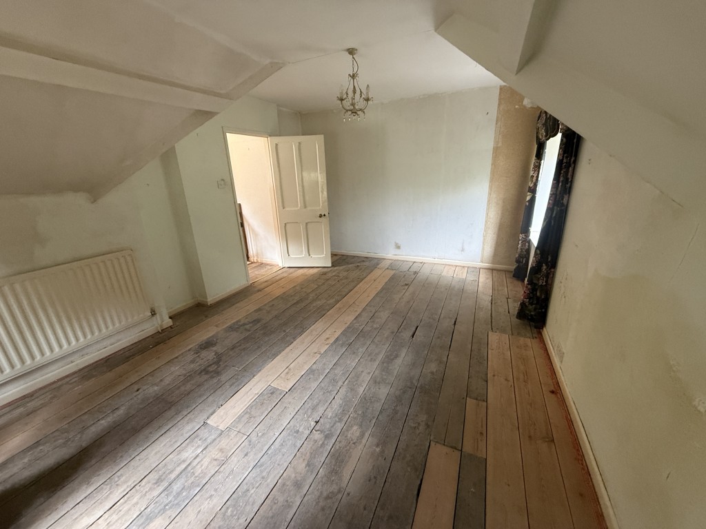Lot: 99 - CHARACTER SEMI-DETACHED COTTAGE FOR UPDATING WITH LARGE GARDENS - Bedroom one view two